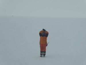 It takes a fearless Jess, the Winter Station Leader, to guide a plane into its parking spot.