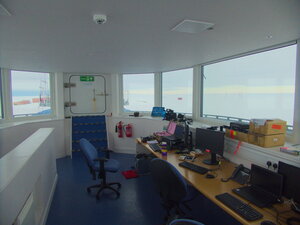 From one office to another! To use those words seriously undervalues how amazing a working environment this is, in the roof area of the H2 science module at Halley.