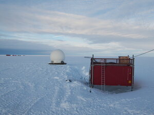 Our VSAT dome and "comms" caboose. The latter actually now houses the full IT infrastructure so it can be automatically run over winter.